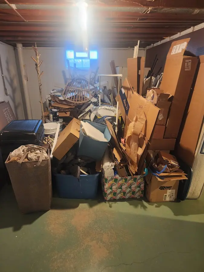 Roll-off dumpster container at job site for Concrete Dumpster Rental in Decorah